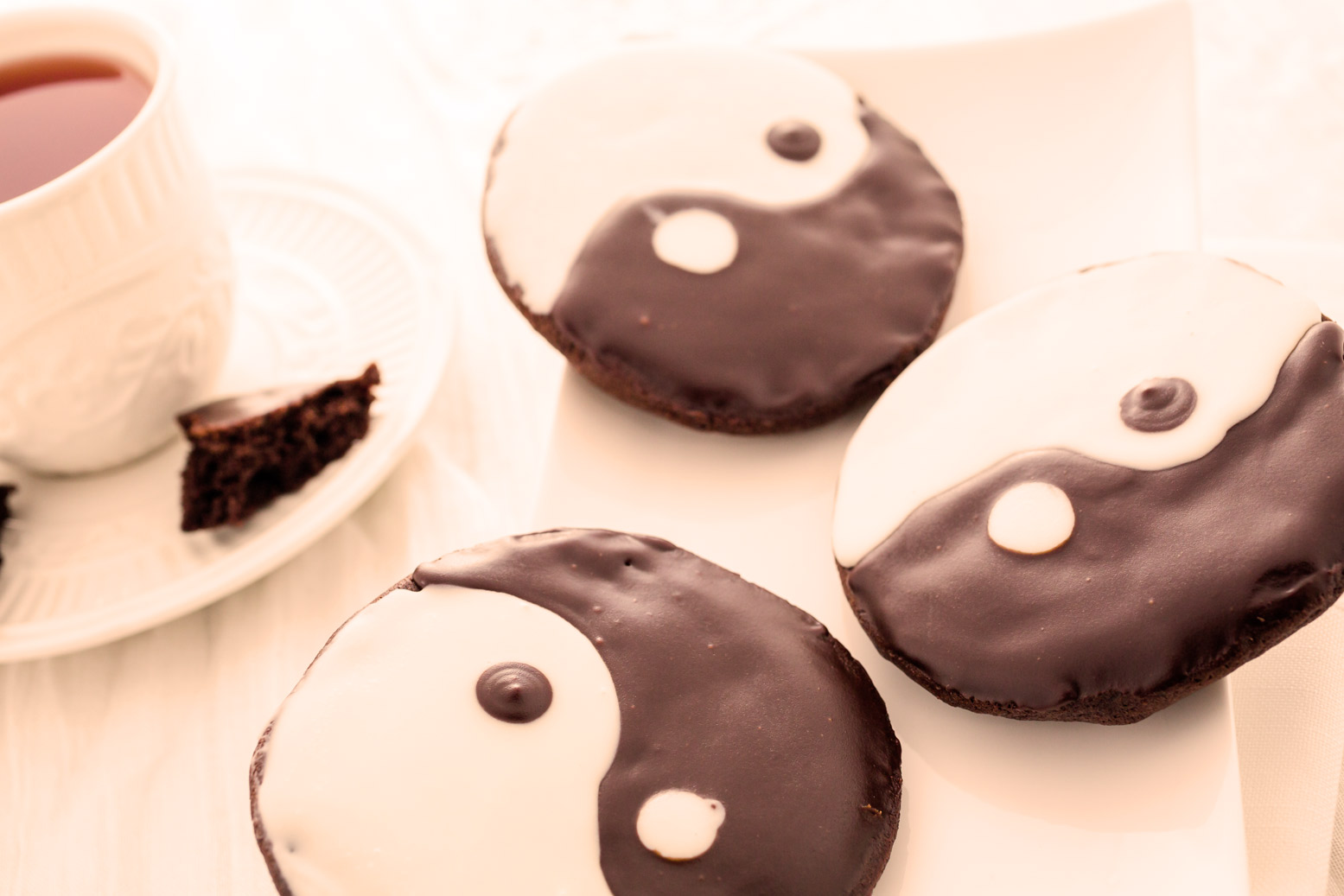 Cookies with Yin Yang Icing and a Cup of Tea